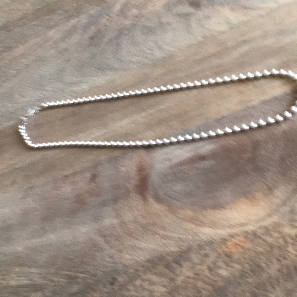 Sterling silver beaded necklace.